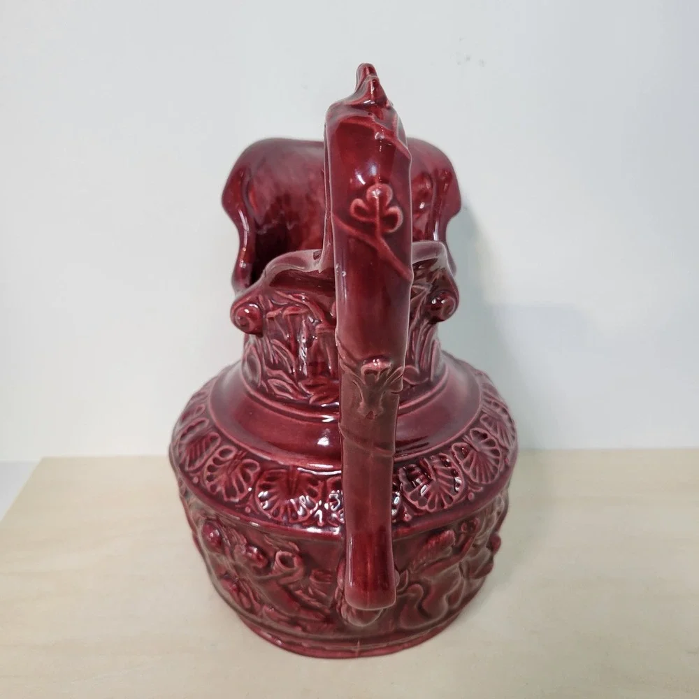 Vintage Burgundy Ceramic Pitcher Jug Relief Figures‎ Embossed Floral Design